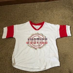 Never worn girls Justice t-shirt.